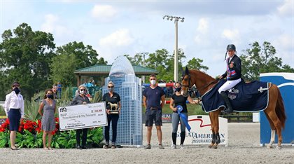 Andre Thieme & CHAKARIA in the prize ceremoney at the Great American $1 Million Grand Prix ©ESI Photography