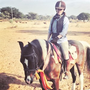 Nikki Watson partnering with 'Abu' on one of her rides © Equestrian Australia