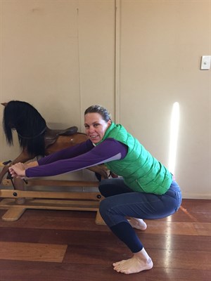 Squatting to check the stretch. © Sally Kirkwood